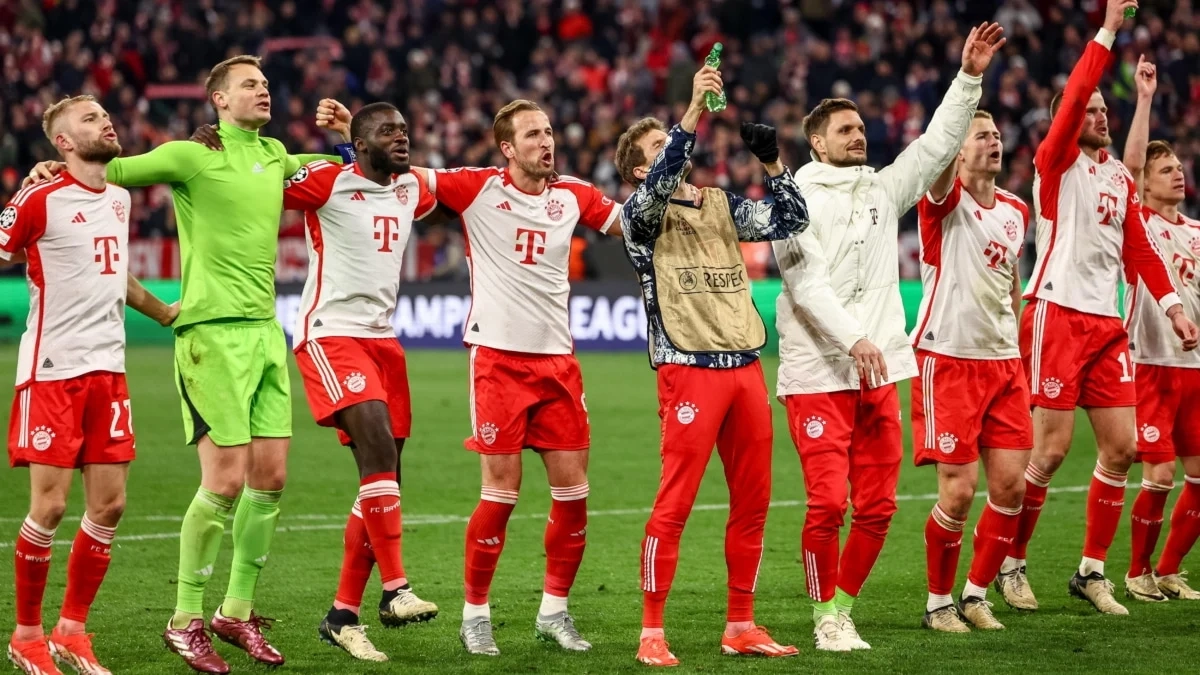 The players of Bayern Munich celebrate a victory with their fans.