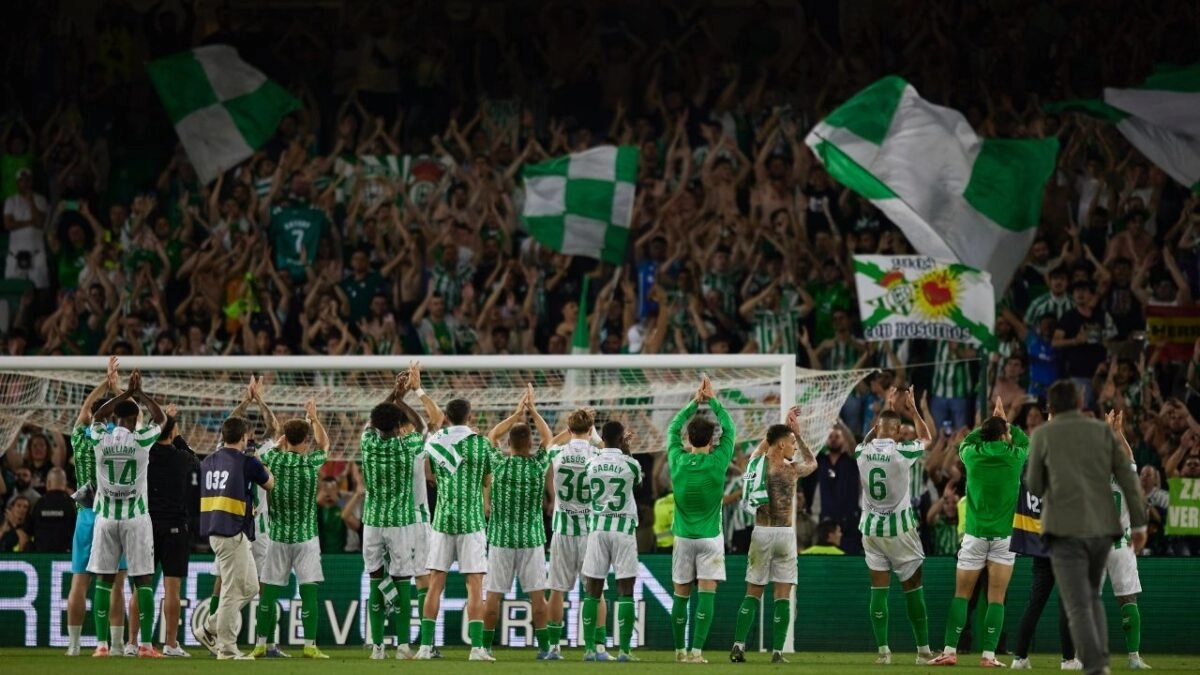 Real Betis players celebrate a victory.