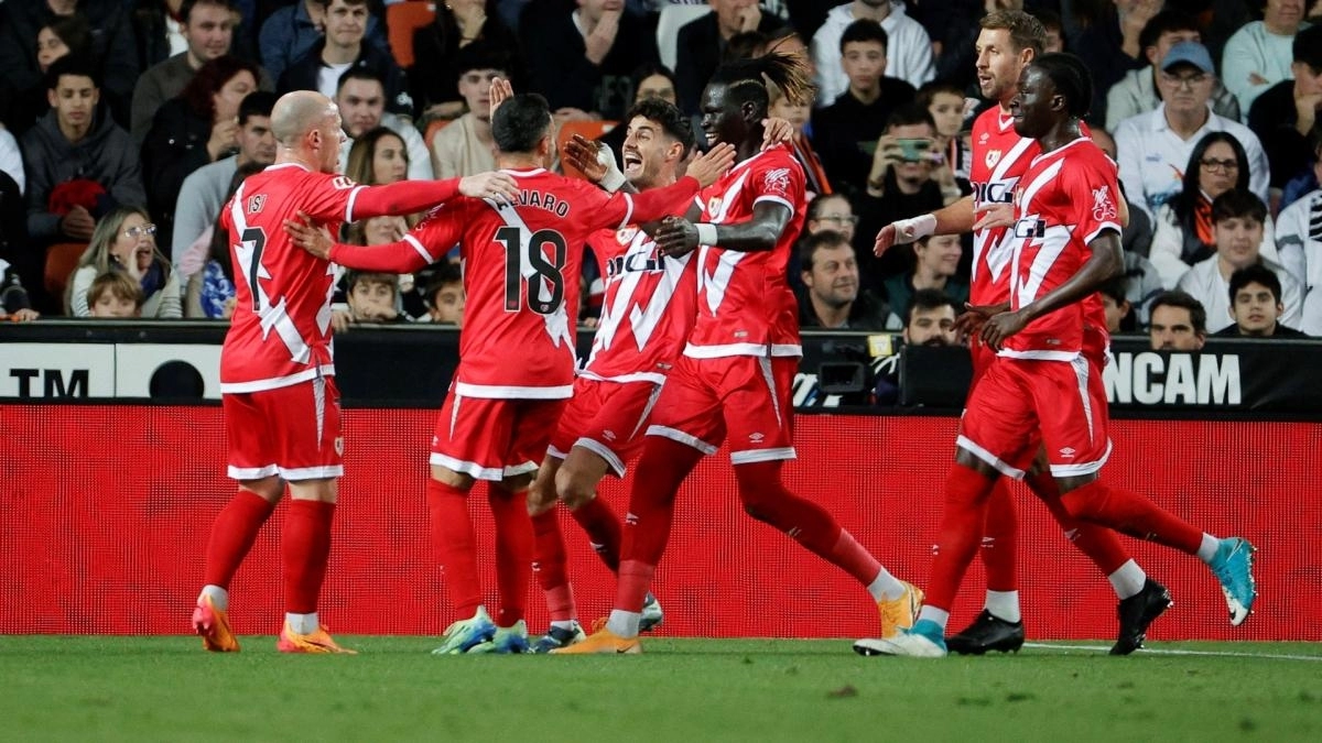 Rayo Vallecano players celebrate a team goal.