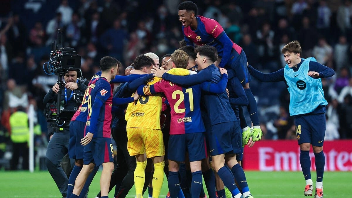 The Barcelona players celebrate a goal