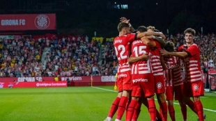 Girona players celebrate a goal