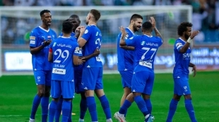 The Al Hilal players celebrate a goal.