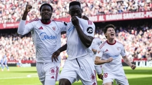 Sevilla players celebrate a goal by Akor Adams.